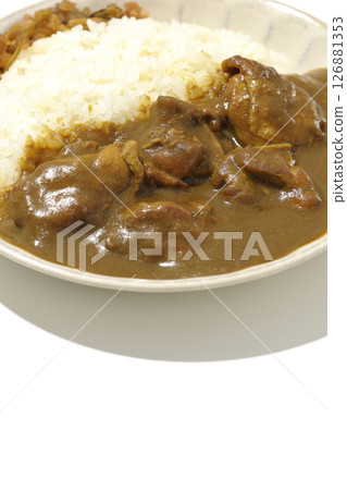 Chicken curry with large chunks of chicken photographed on a white background 126881353