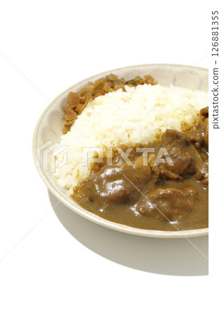Chicken curry with large chunks of chicken photographed on a white background Chicken curry with large chunks of chicken photographed on a white background 126881355
