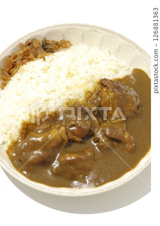 Chicken curry with large chunks of chicken photographed on a white background 126881363