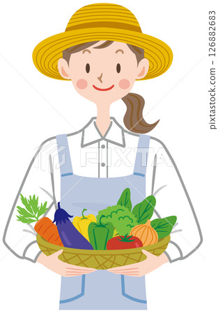 Young woman with a basket of vegetables Young woman with a basket of vegetables 126882683