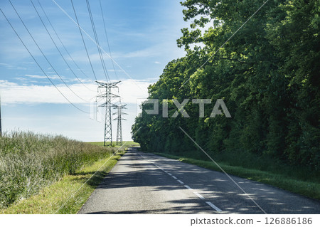 Electricity pylon and nature, real life photo 126886186