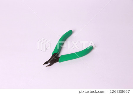 Green handle pliers 126888667