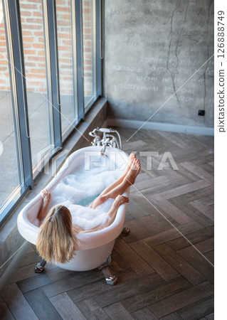 Woman relax in bathrobe at home, closeup 126888749