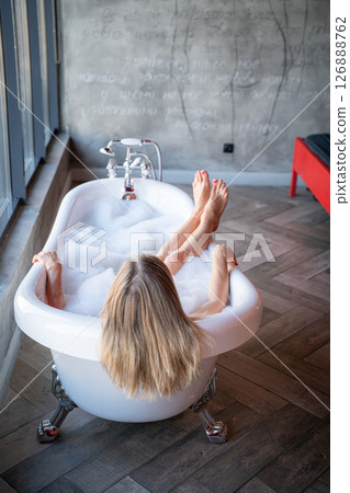 Woman relax in bathrobe at home, closeup 126888762