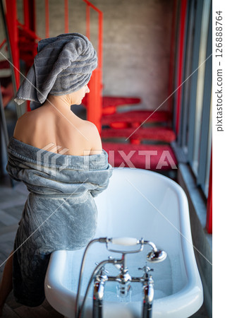 Woman relax in bathrobe at home, closeup 126888764