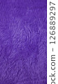 Purple faux fur background creating soft texture 126889297