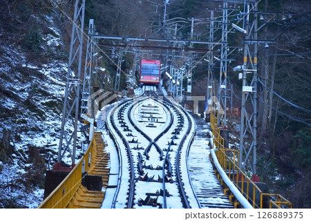 The Koyasan Cable Car runs through the snow. The Koyasan Cable Car runs through the snow. 126889375
