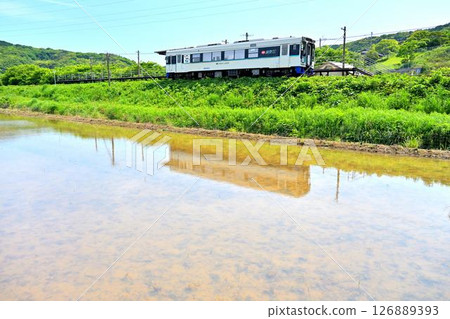 Train with rice fields in countryside Nishitahira station part 2 126889393