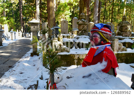 A view of the makeup Jizo statue on the approach to Koyasan Okunoin 126889562