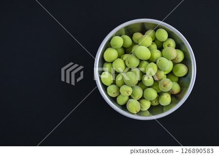 Harvested plum fruit 126890583