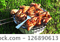 Hot Spicy Smoky chicken wings on grass 126890613