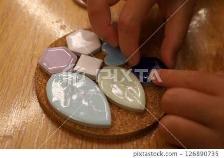 Children making artwork with tiles 126890735