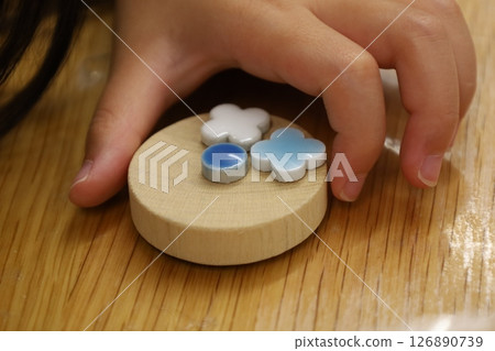 Children making artwork with tiles 126890739