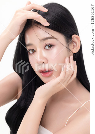 Close up glass skin make up style of beautiful young Asian model isolated on white background. Close up glass skin make up style of beautiful young Asian model isolated on white background. 126891167
