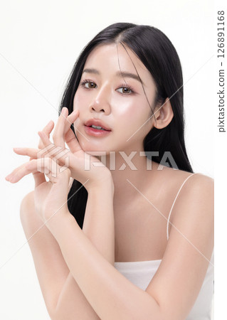 Close up glass skin make up style of beautiful young Asian model isolated on white background. Close up glass skin make up style of beautiful young Asian model isolated on white background. 126891168