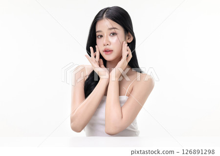 Glowing skin make up style of beautiful young Asian model isolated on white background. 126891298