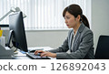A woman who operates a PC 126892043