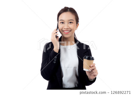 Portrait cheerful young asian businesswoman holding coffee cup while talking smart phone with relax. Portrait cheerful young asian businesswoman holding coffee cup while talking smart phone with relax. 126892271