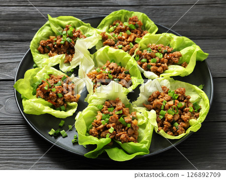 Fresh and Crispy Ground Chicken lettuce wraps Fresh and Crispy Ground Chicken lettuce wraps 126892709