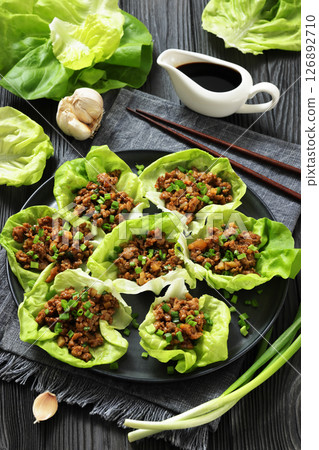 Fresh and Crispy Ground Chicken lettuce wraps Fresh and Crispy Ground Chicken lettuce wraps 126892710