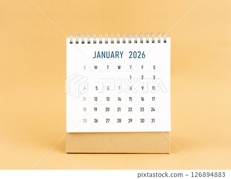 January 2026 desk calendar on yellow background, Front view. 126894883