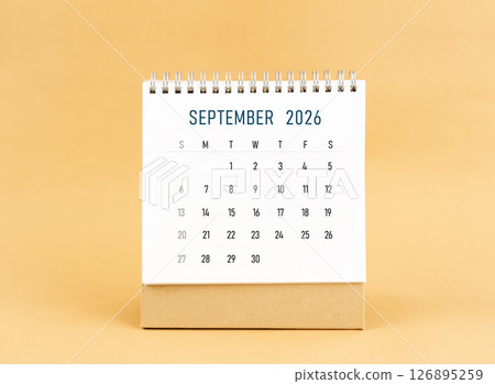 September 2026 desk calendar on yellow background, Front view. September 2026 desk calendar on yellow background, Front view. 126895259
