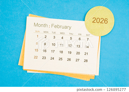 February 2026 calendar page on blue background. 126895277