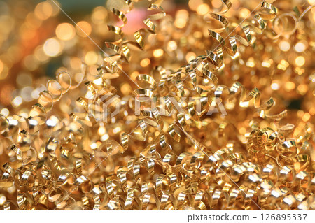 Close up scene scrap brass material pile from turning process. Close up scene scrap brass material pile from turning process. 126895337