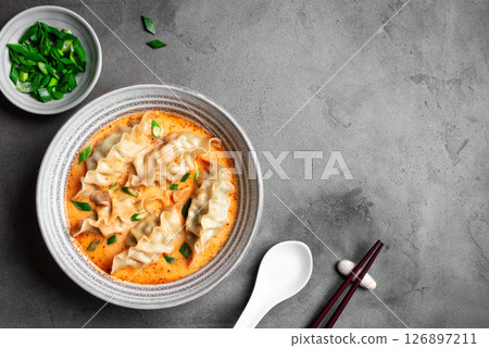 Thai Coconut Curry Dumpling Soup 126897211