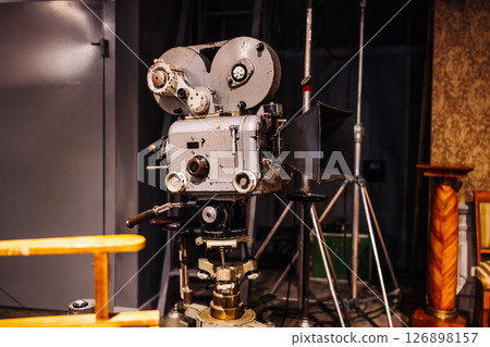Vintage movie camera is recording in a studio Vintage movie camera is recording in a studio 126898157