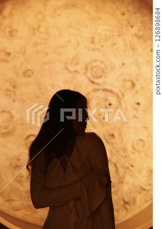 A Stunning Silhouette Set Against a Beautiful Celestial Background for Artistic Expression 126898684