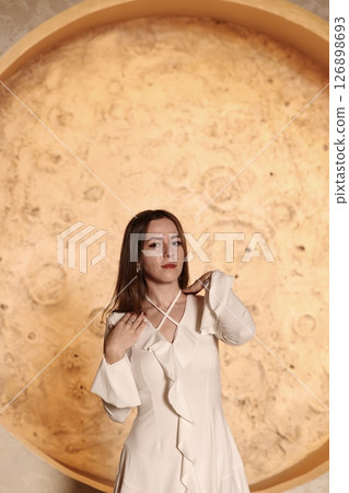 An Elegant Portrait Set Against a Beautifully Textured Background for Artistic Impact An Elegant Portrait Set Against a Beautifully Textured Background for Artistic Impact 126898693