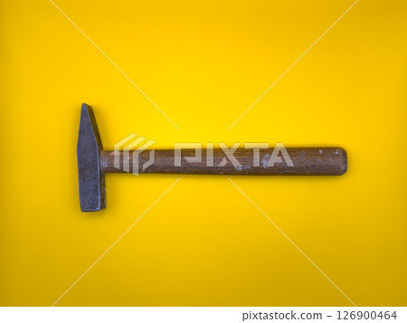Rusty hammer on yellow background. Builder Tool. Flat lay. Top view, copy space. 126900464