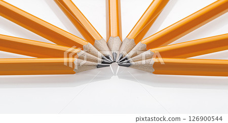 sharpened yellow graphite pencils arranged in a fan on white background. Perfect for school supplies and creative projects 126900544