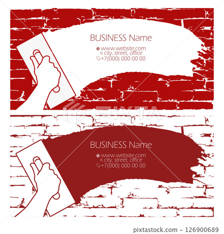 Spatula in hand spreads plaster on brick wall. Business card plasterer concept 126900689