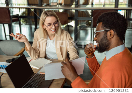 Group of business consultants looking involved while discussing a new case 126901281