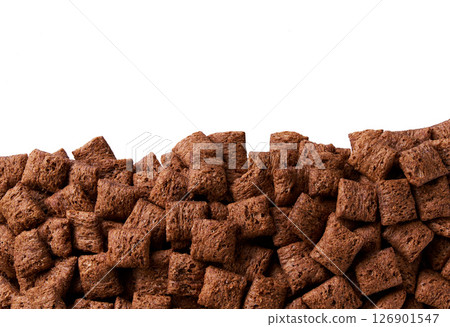 chocolate corn pads in a white background, close up. top view. Tasty chocolate corn pads in a white background. chocolate corn pads in a white background, close up. top view. Tasty chocolate corn pads in a white background. 126901547