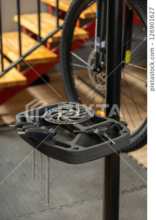 Close-up of bicycle wheel on repair stand Close-up of bicycle wheel on repair stand 126901627