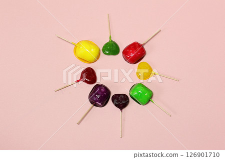 Colorful lollipops on a pink background 126901710