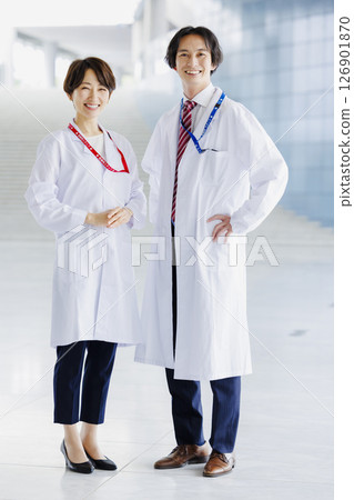 Male and female doctors working in a hospital 126901870