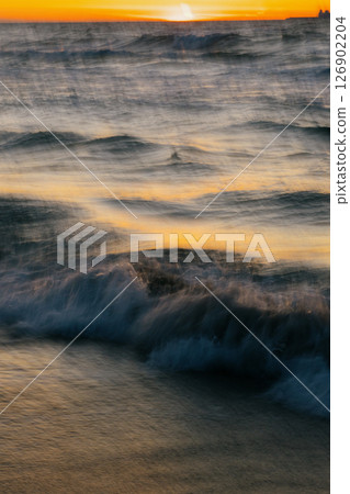 blurry photo of ocean against a sunset background. beauty in nature. blurry photo of ocean against a sunset background. beauty in nature. 126902204