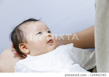 Baby embraced by dad Baby embraced by dad 126902365