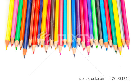 A vibrant row of sharpened colored pencils in various hues against a white background 126903243