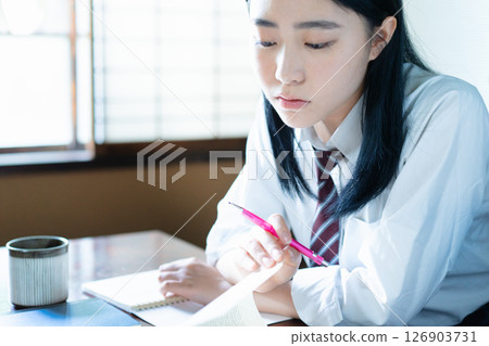 Girls high school studying at home Girls high school studying at home 126903731