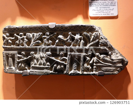 A relief on display at the Peshawar Museum in Pakistan, the center of Gandhara art A relief on display at the Peshawar Museum in Pakistan, the center of Gandhara art 126903751