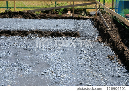 Image of house foundation work (crushed stone paving) Image of house foundation work (crushed stone paving) 126904501
