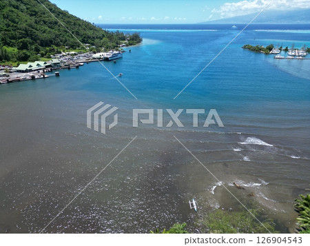Aerial view of the coastline of Vaiare harbor on Moorea island in Tahiti 126904543
