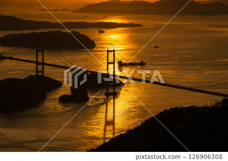 《Ehime Prefecture》Sunset over the Kurushima Kaikyo Bridge and the view from Kirosan Observatory 126906308