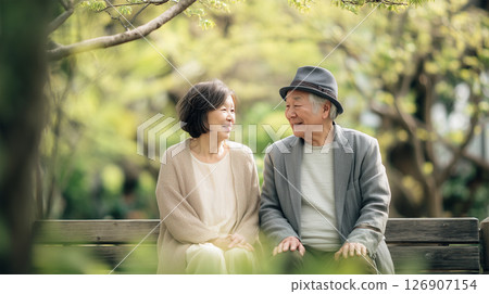 Spring sunshine and smiling senior couple 126907154