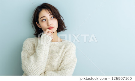 The expression of a thoughtful Japanese woman 126907160